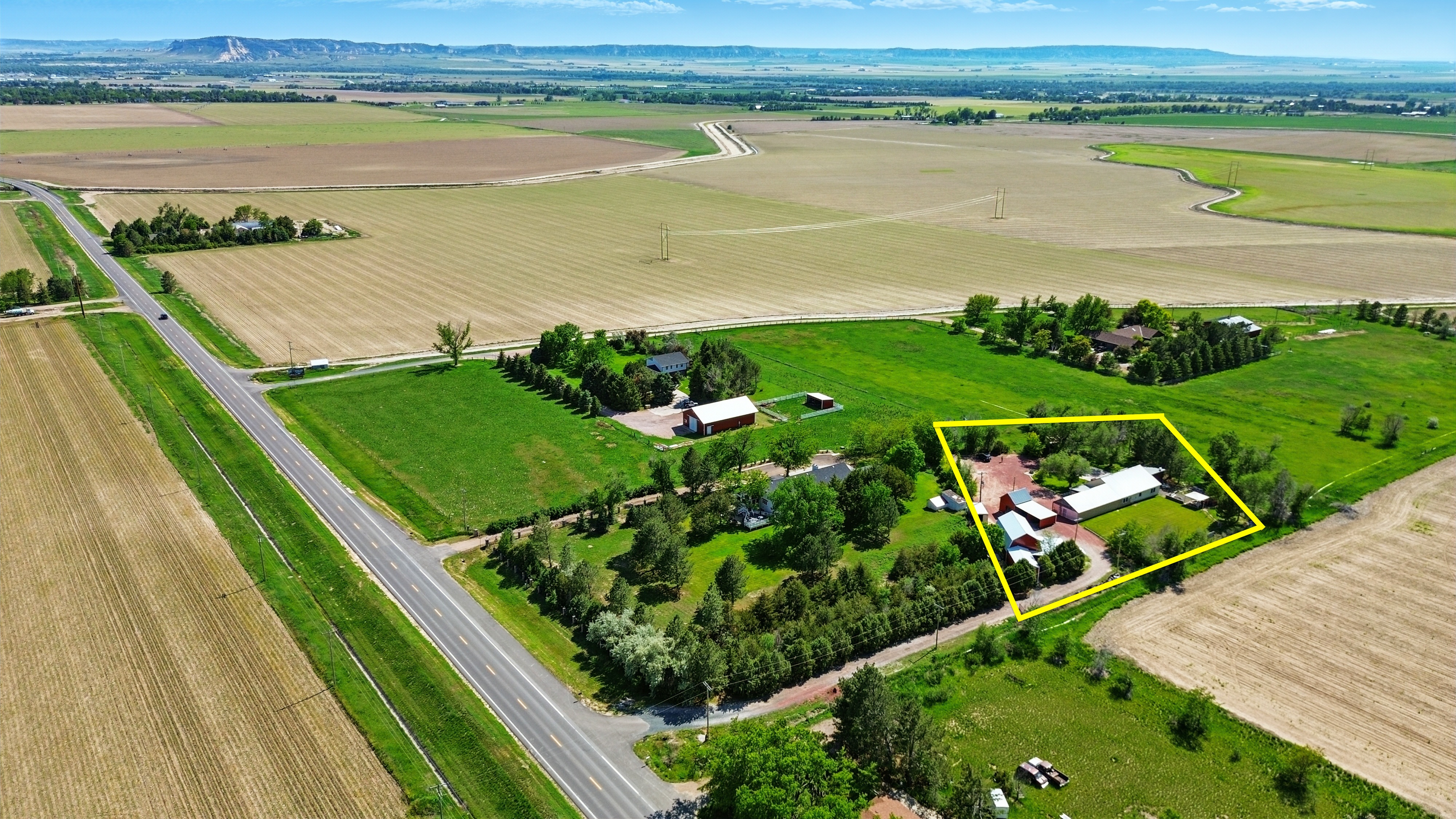 Aerial shot showcasing property grounds and landscape features