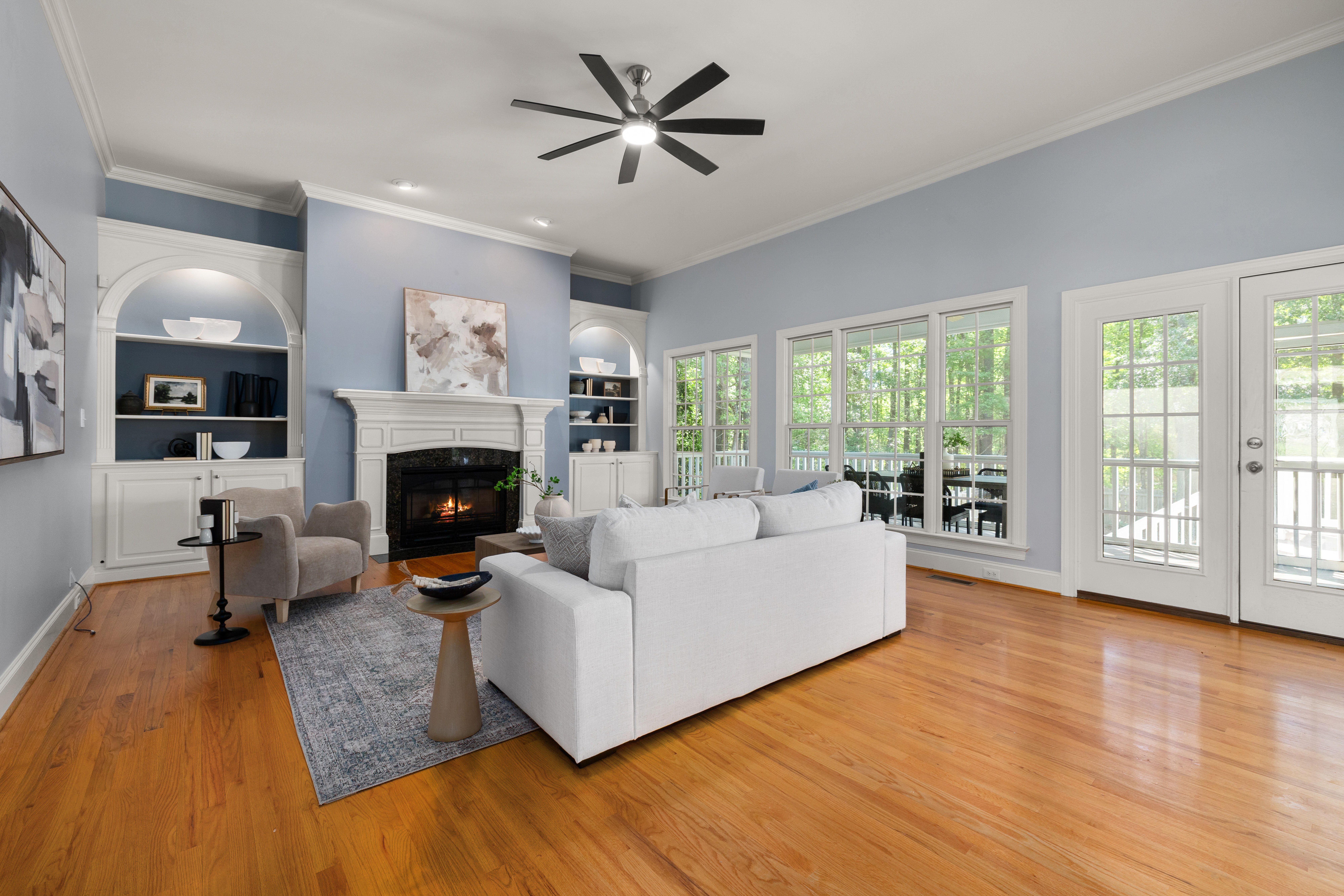 Bright, well-lit living room with natural and interior lighting