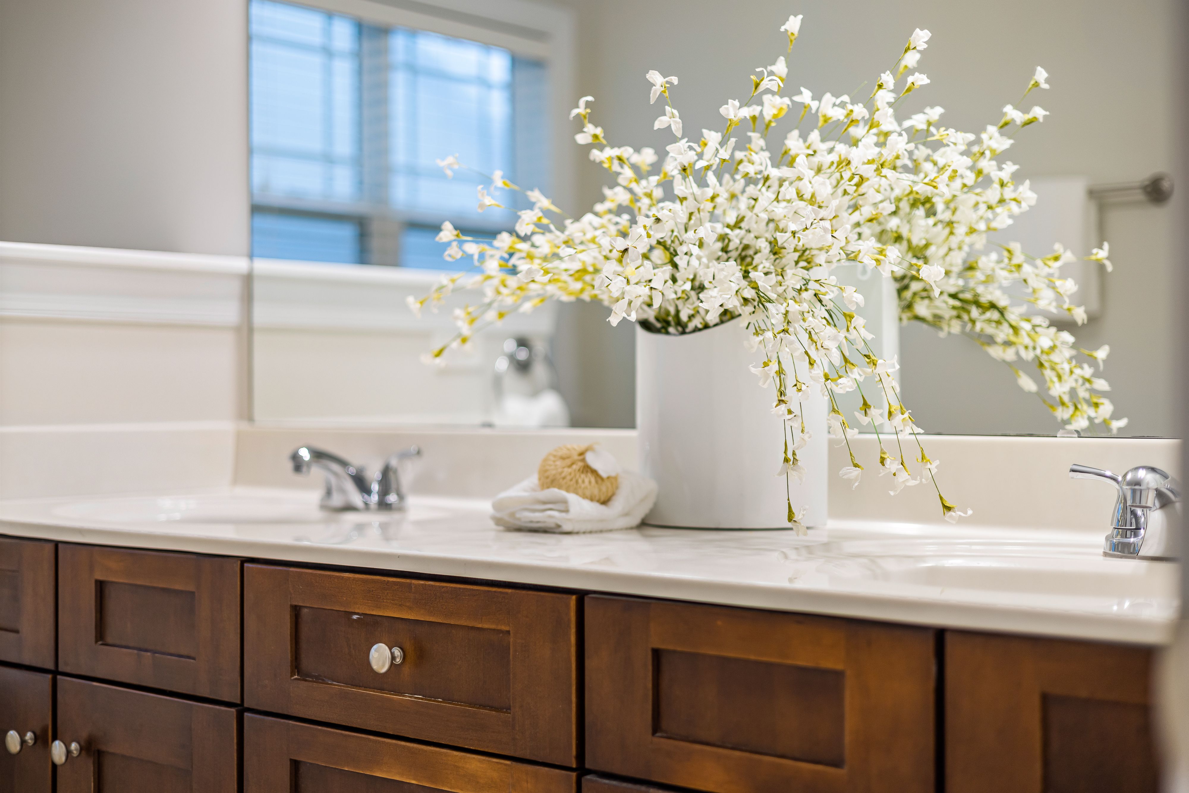 Styled bathroom sink showing balanced staging